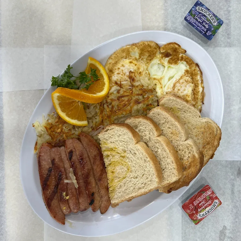 Pastrami plate with toast and fries at Omega Burgers